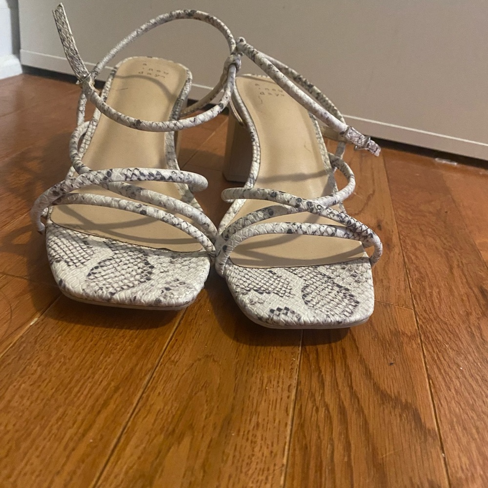 SNAKE HEELED SANDALS